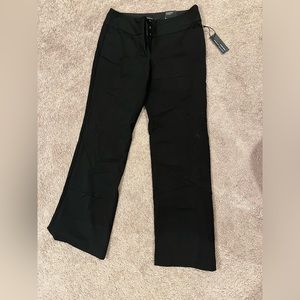 Women’s black Express dress pants.